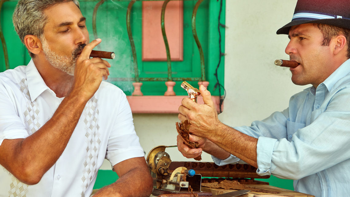 man smoking cigar